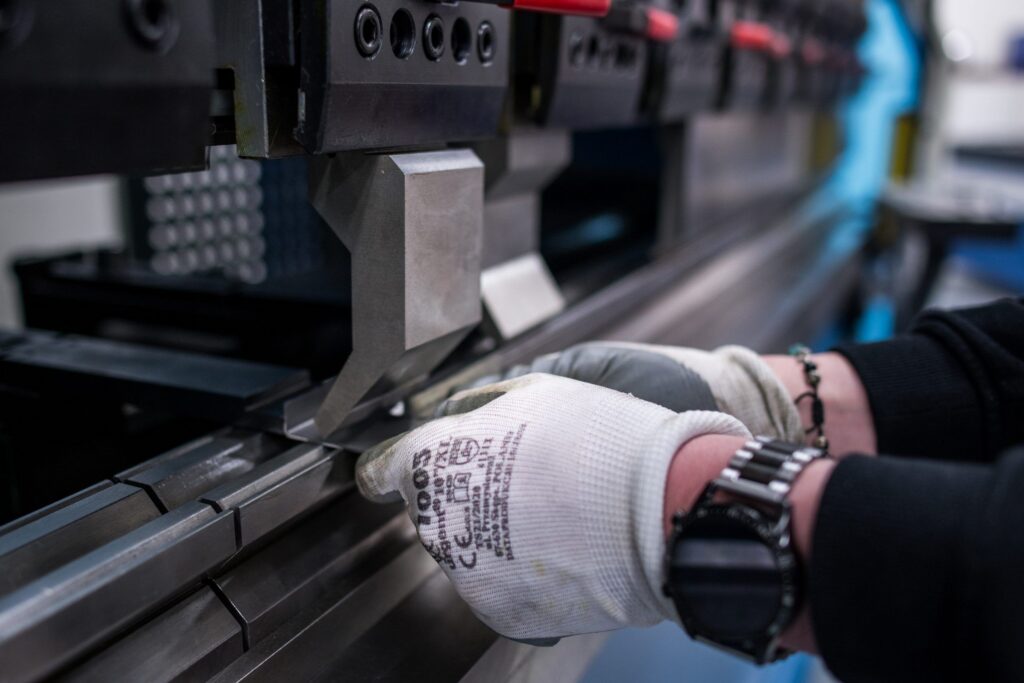 Bending of a C-channel using press brake clamps that securely hold the profile during forming. The clamping system ensures stability, precision, and repeatable bending accuracy.